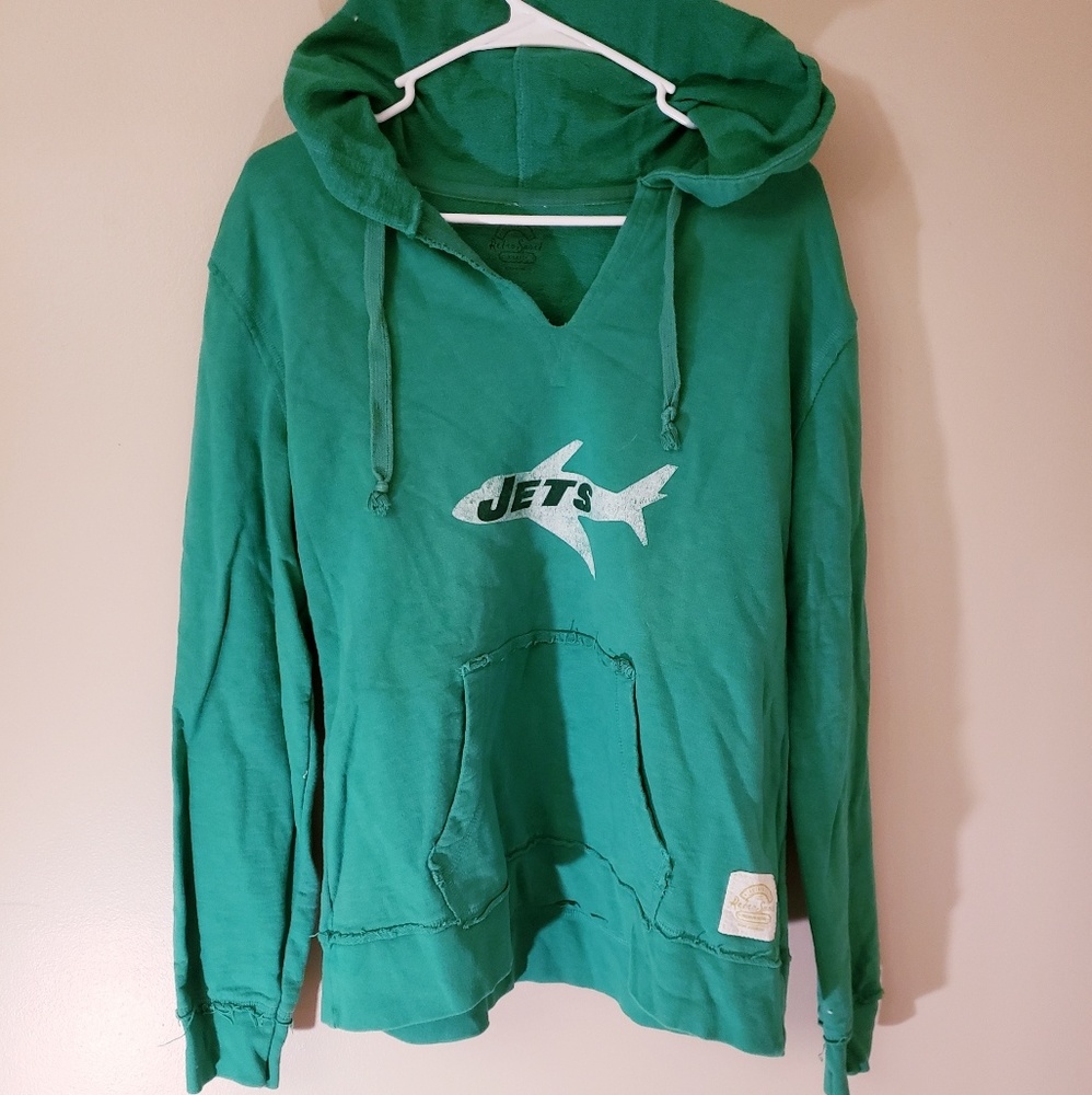 Women’s distressed NY Jets sweatshirt.